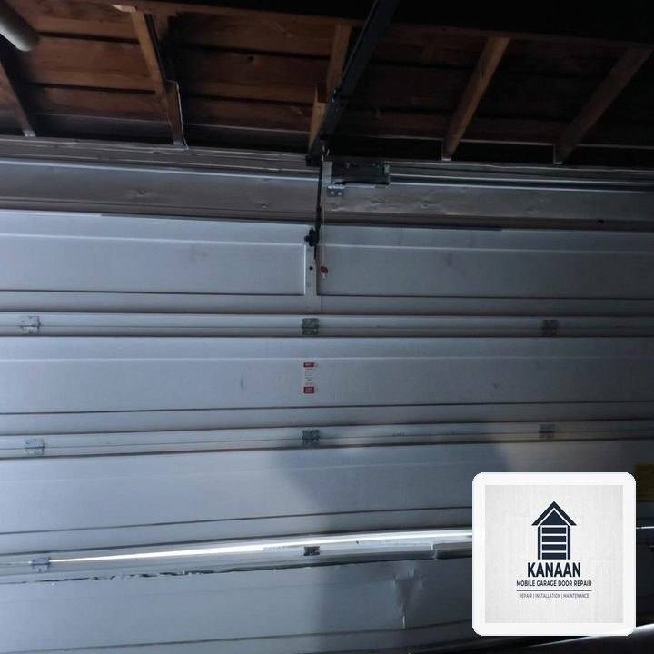 Emergency Garage Door Spring Repair & High-Cycle Torsion Replacement in Bellevue, WA